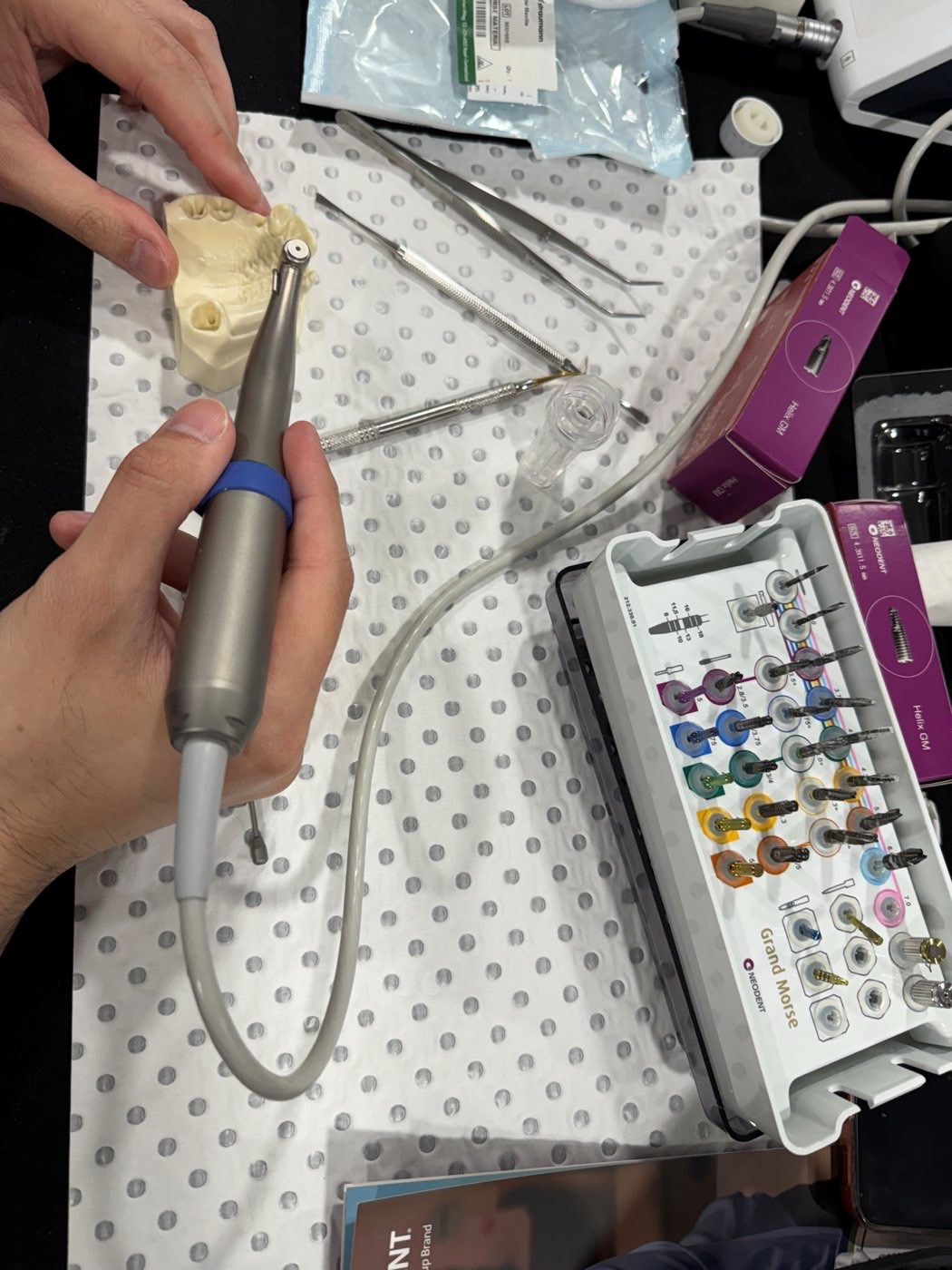 Practising the drill sequence on a model with the Neodent surgical kit