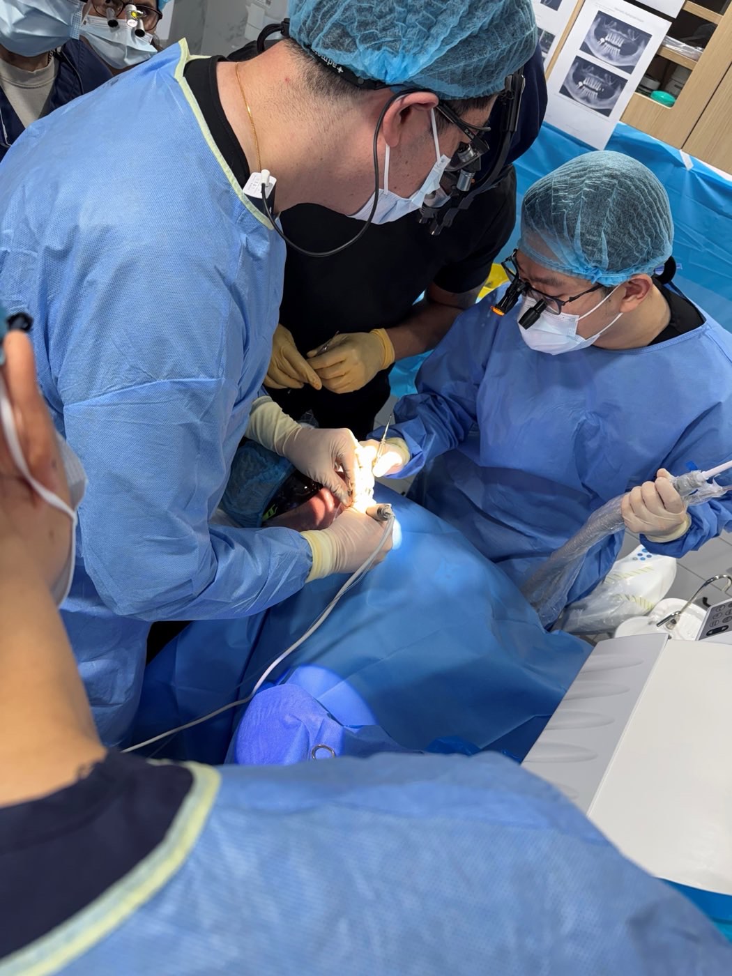Participants placing an implant under specialist supervision
